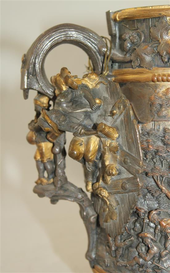 A late 19th century Dutch mixed metal tankard and oval tray, 9in.